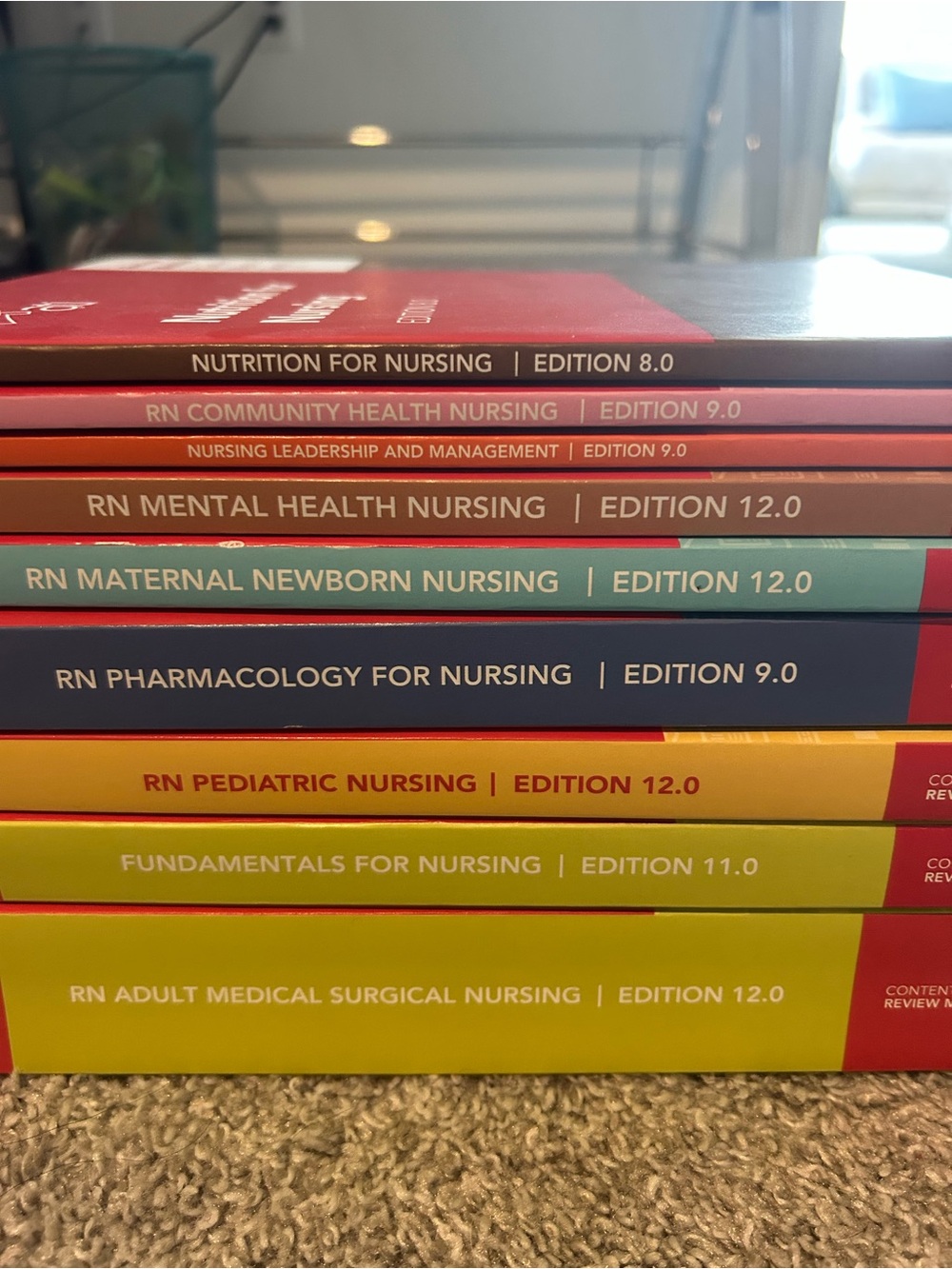Set of colorful nursing textbooks